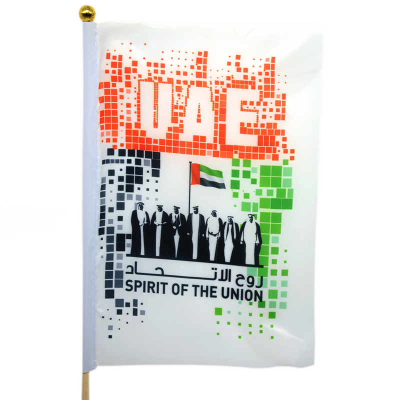 UAE SPIRIT OF THE NATION+UAE TEXT WHITE FLAG W/ STICK 20X30CM