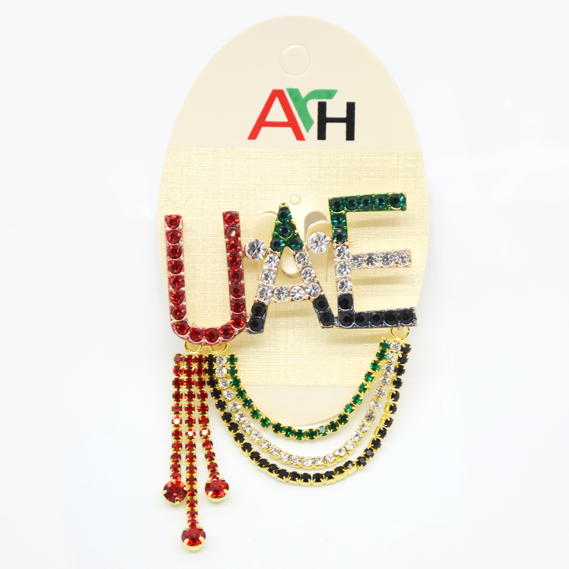 "BADGE PIN ""UAE"" W/STONE"