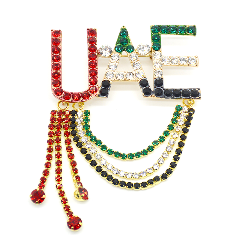 "BADGE PIN ""UAE"" W/STONE"